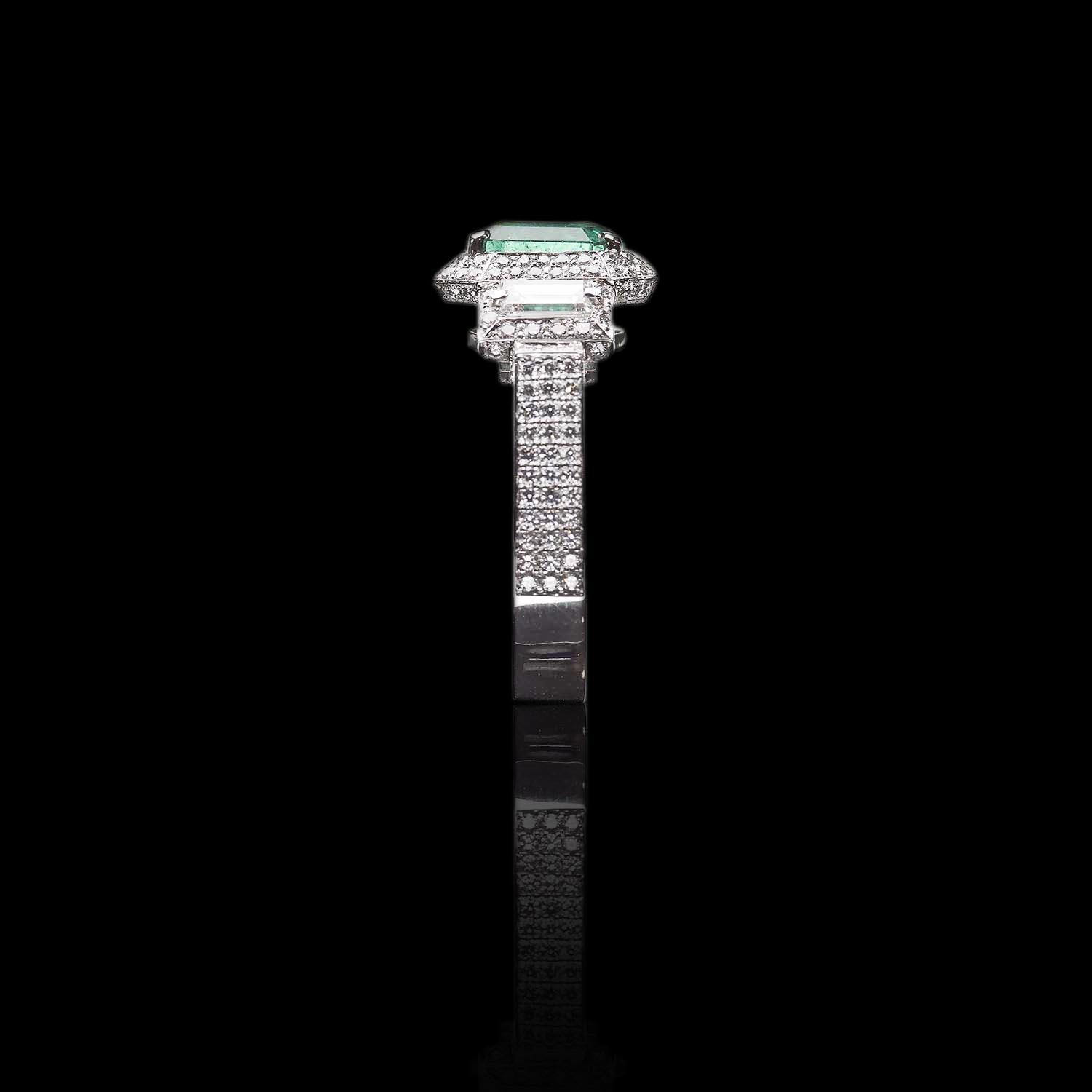 The Moon Ocean Halo Rings in Platinum with Emerald Centre Stone Alternate shot 3