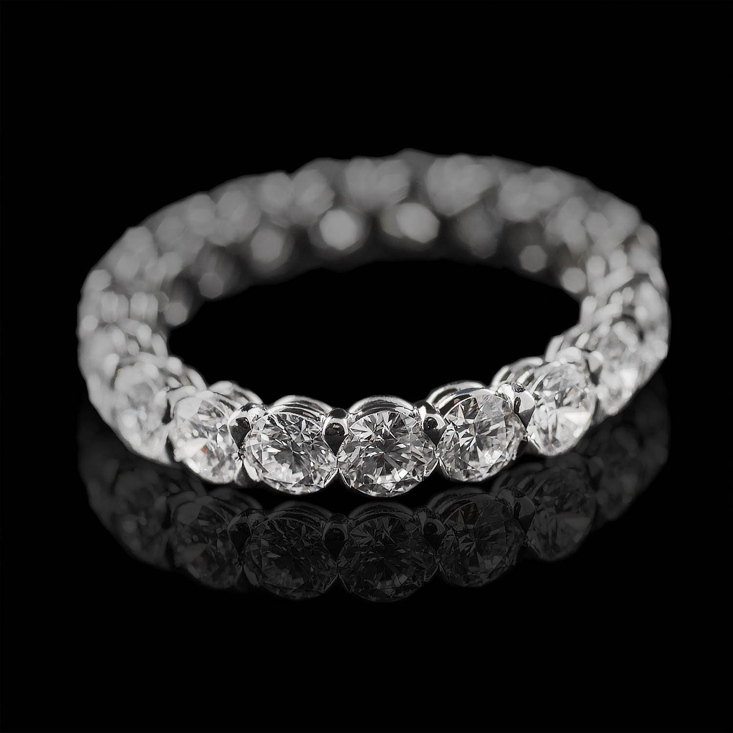 The Moon Ocean Eternity Rings in 18ct White Gold with Round Centre Stone Alternate shot 4