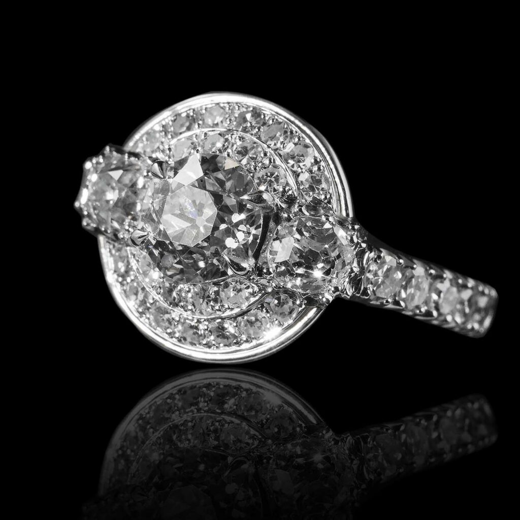 The Moon Ocean Three Stones Rings in Platinum with Round Centre Stone Alternate shot 2