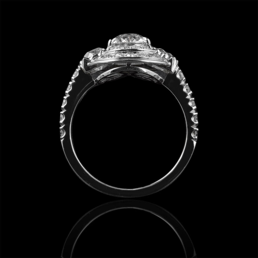 The Moon Ocean Three Stones Rings in Platinum with Round Centre Stone Alternate shot 3