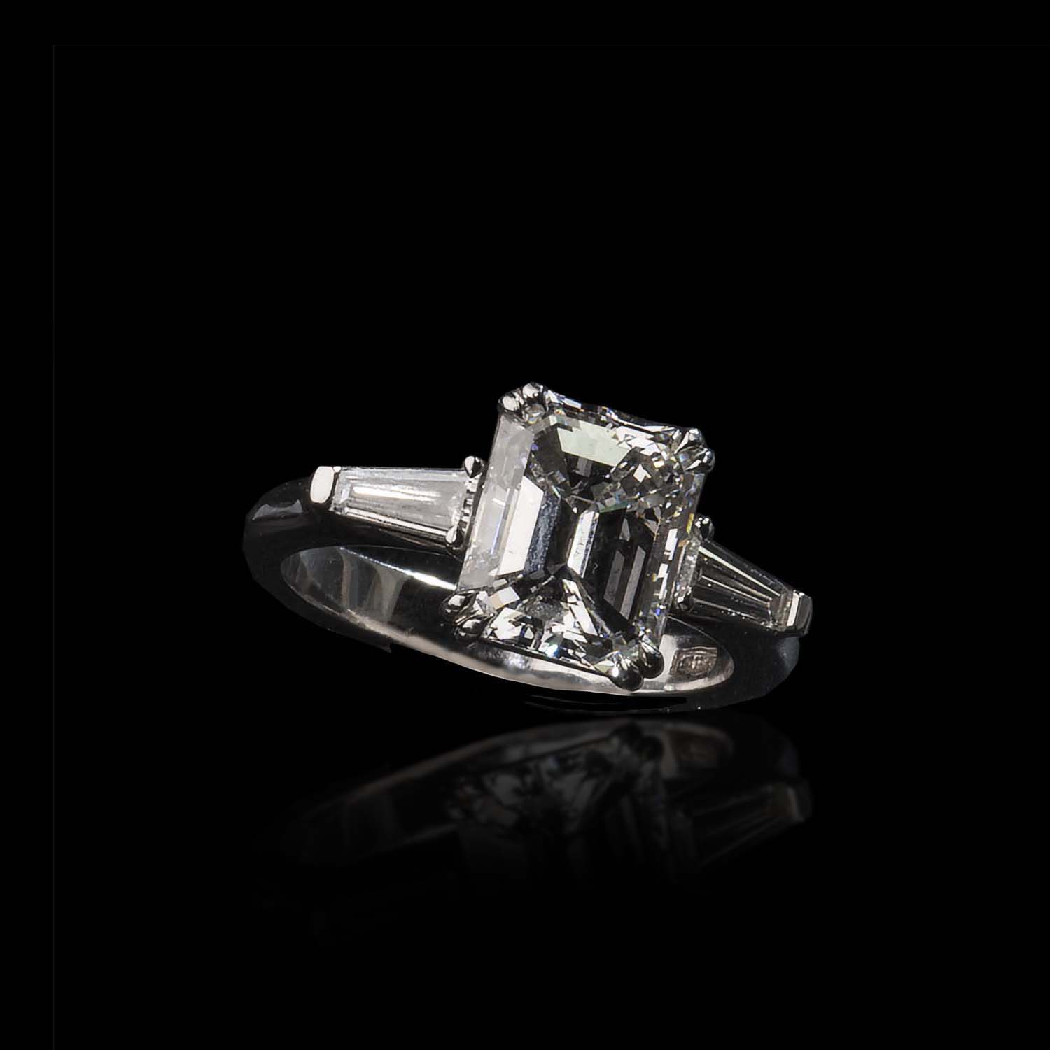 The Moon Ocean Rings in Platinum with Emerald Centre Stone Alternate shot 4
