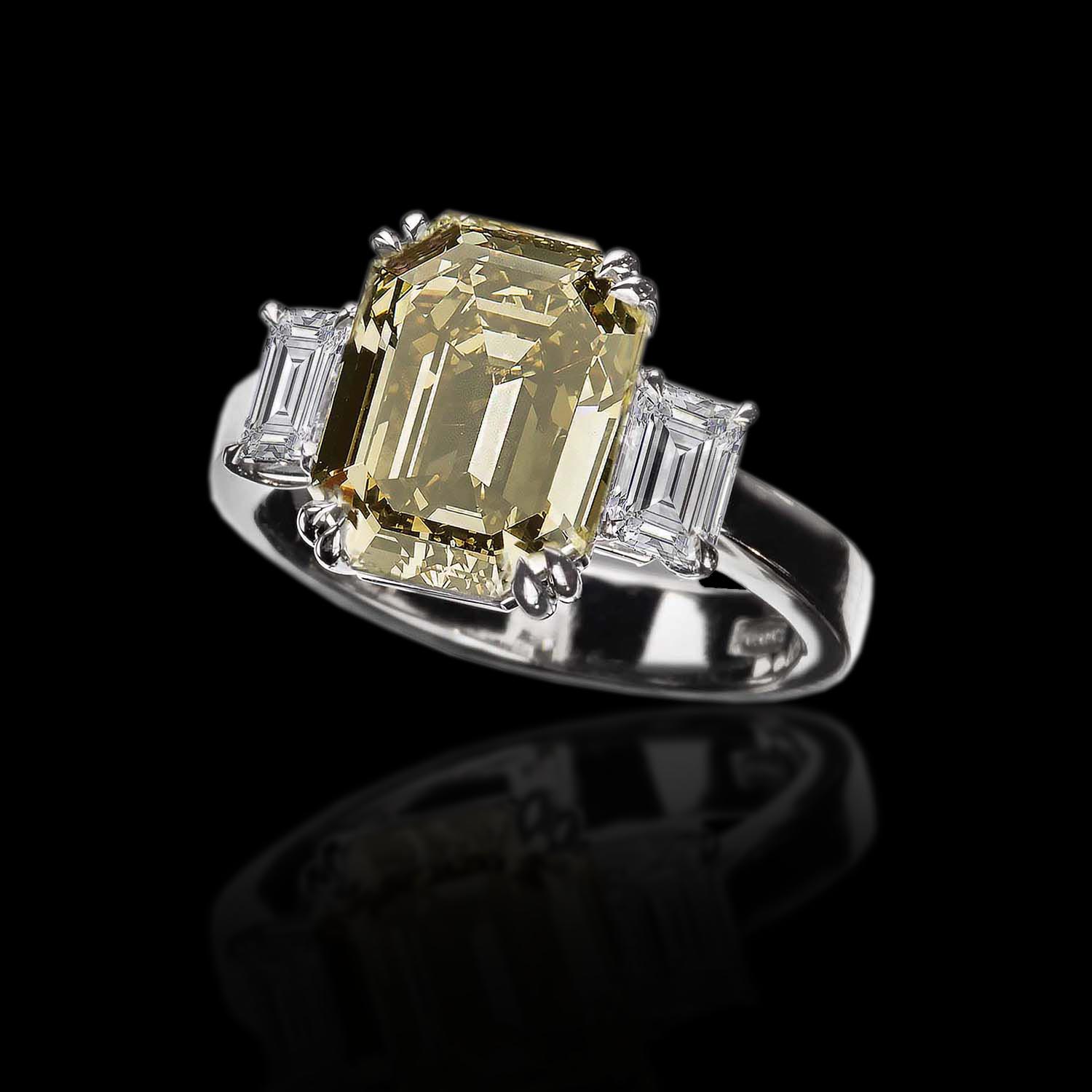 The Moon Ocean Rings in Platinum with Emerald Centre Stone Alternate shot 2