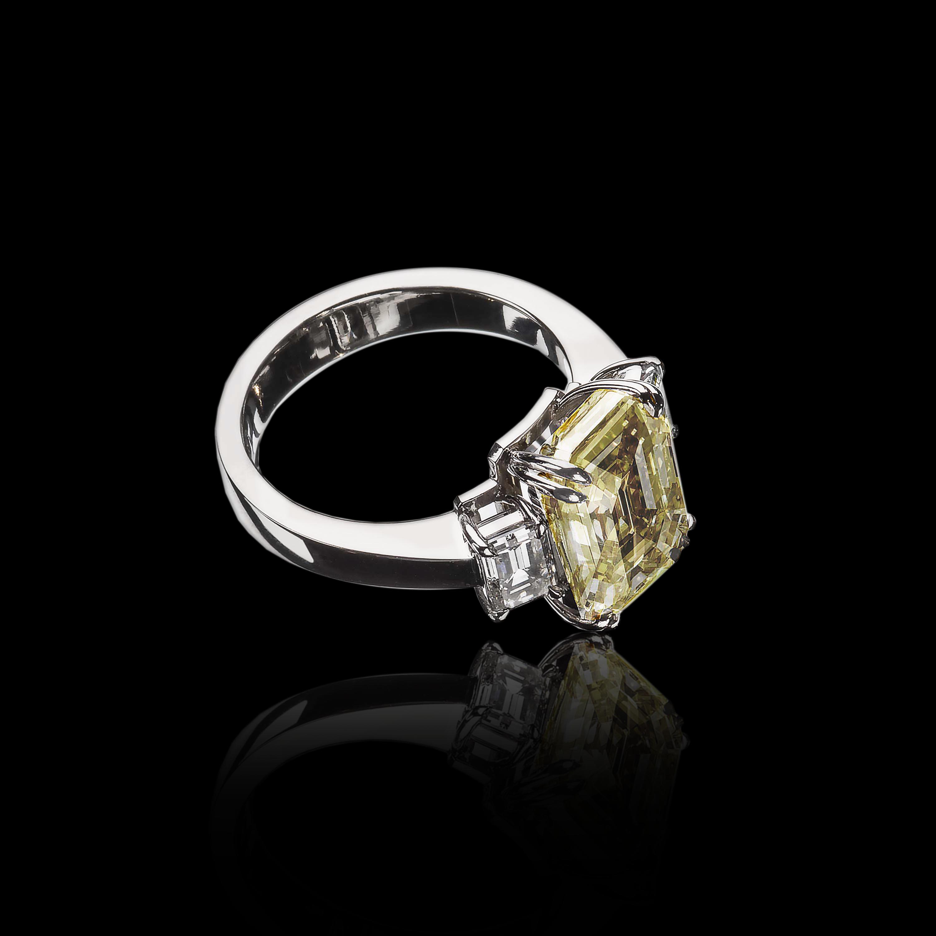 The Moon Ocean Rings in Platinum with Emerald Centre Stone Alternate shot 4