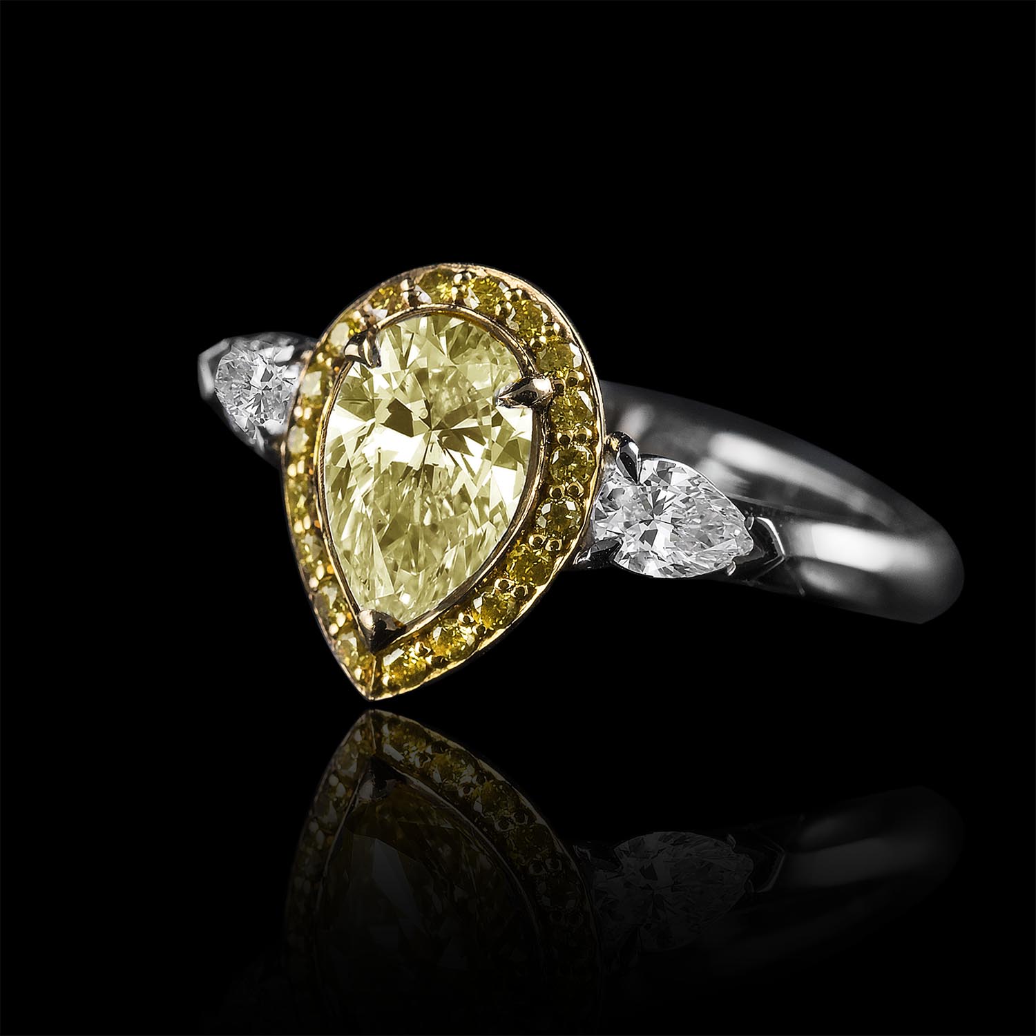 The Moon Ocean Halo Rings in Platinum with Pear Centre Stone Alternate shot 2