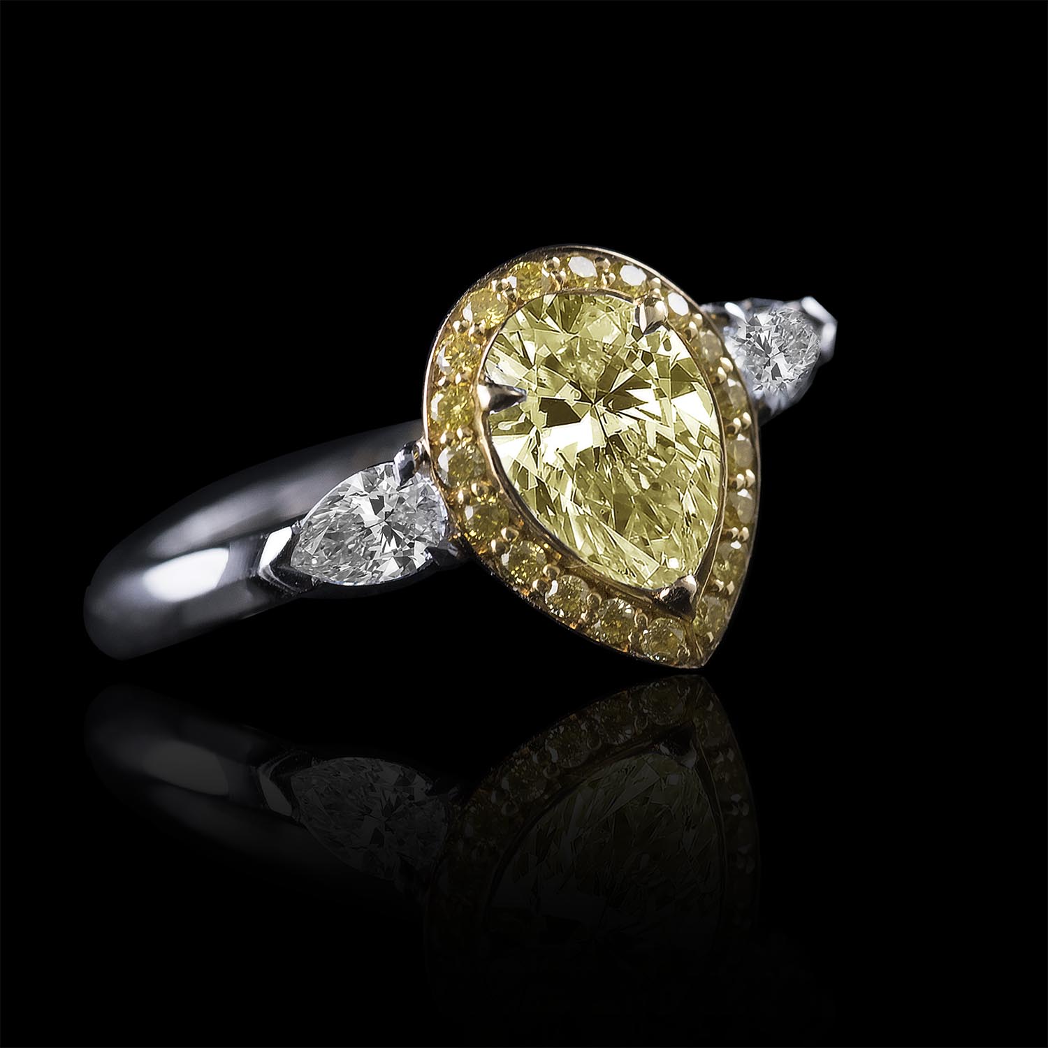 The Moon Ocean Halo Rings in Platinum with Pear Centre Stone Alternate shot 3