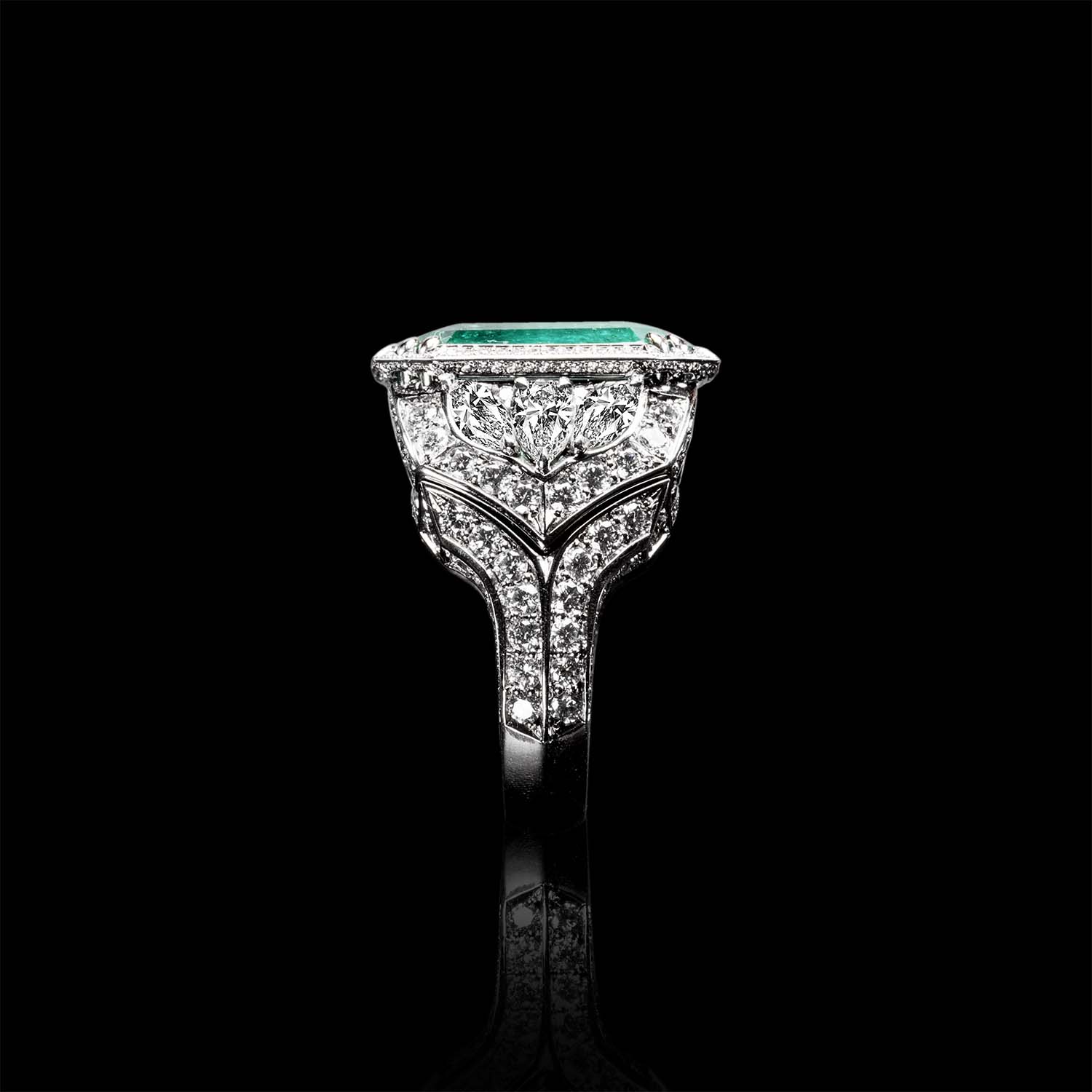 The Moon Ocean Rings in Platinum with Emerald Centre Stone Alternate shot 2
