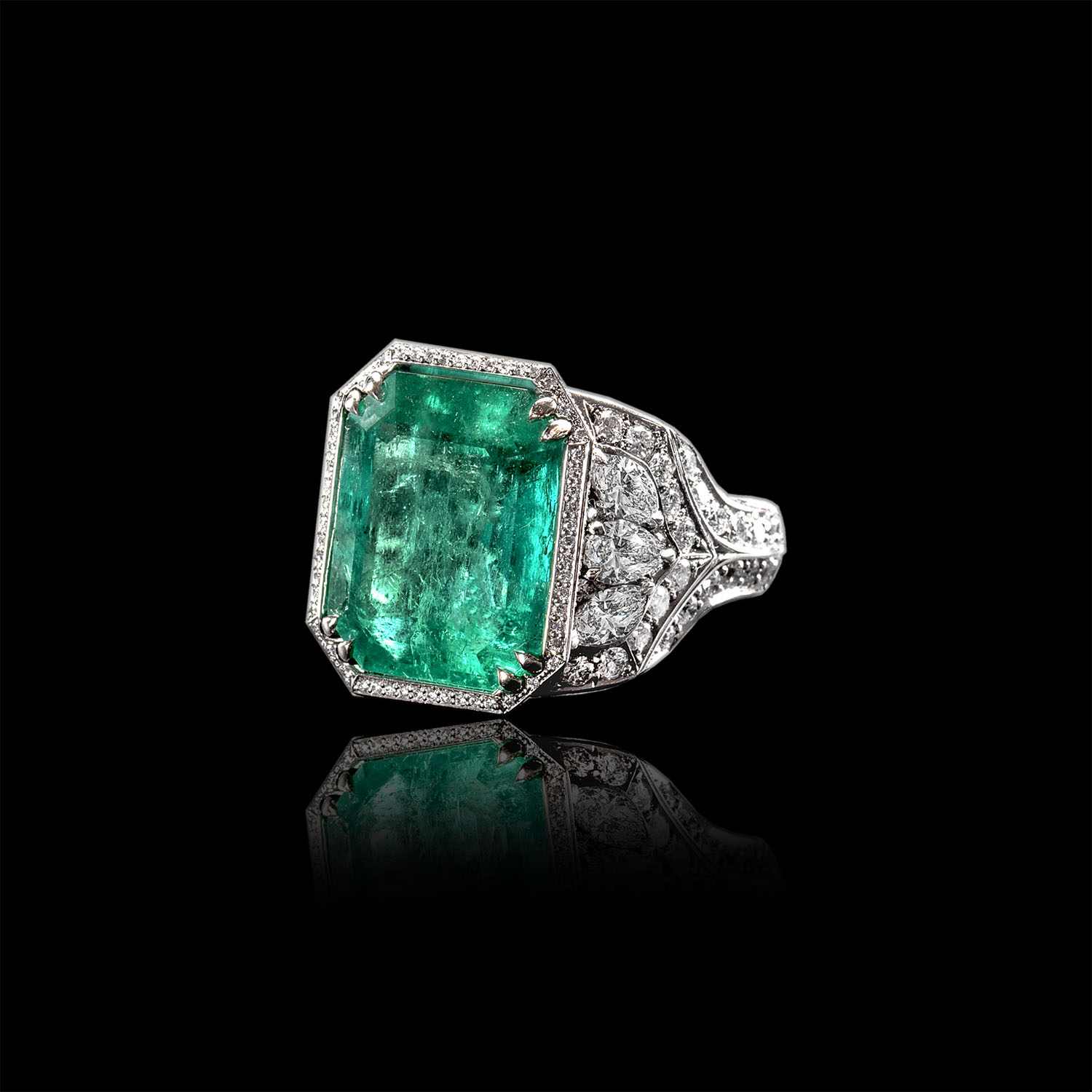 The Moon Ocean Rings in Platinum with Emerald Centre Stone Alternate shot 4